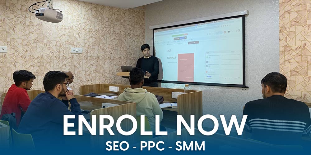 A classroom of students facing a projected slide, with an Enroll Now banner for SEO, PPC and SMM training